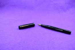 A Watermans Ideal 32A leverfill fountain pen in black with a single narrow band to the cap and a