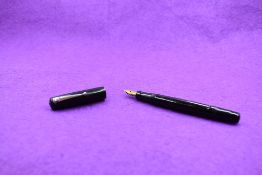 A Mabie Todd & Co Self filler leverfill fountain pen in black with chased design with Swan No2