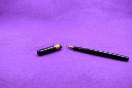 A Mabie Todd & co Swan No2 Eyedropper fountain pen in chased BHR, screw cap with broad band, with