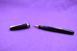 A Watermans 515 leverfill fountain pen in black with single broad band to cap, a Watermand 5 nib,