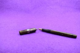 A Mabie Todd & Co Jackdaw Self filler Leverfill fountain pen, in BHR (discoloured), with a single