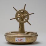 A vintage ships wheel styled ash tray