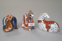 Three Royal crown Derby paperweights, A snake, a dragon and a horse, repair to dragon and all are