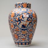 A large Imari palette ginger jar having lid with base having antique restoration 30cm high