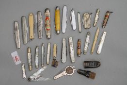 A selection of vintage and antique pen knives including collectable, coronation and mother of