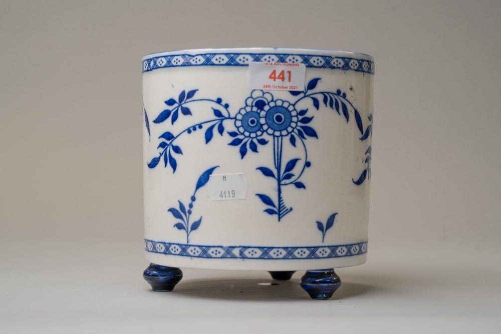 A blue and white wear plant or similar pot on three footed base stamped for Minton 16cm tall 16cm