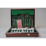 A canteen of cutlery and flatwares by Oneida Sheffield made for serving six in fine condition with