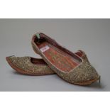 A pair of antique middle eastern Islamic style slippers having fine hand stitched details
