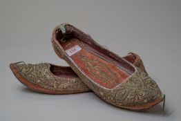 A pair of antique middle eastern Islamic style slippers having fine hand stitched details