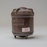 A vintage 1920's phenolic or bakelite tobacco jar with screw top lid and tobacco name badge to
