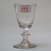A Victorian toasting glass having a knop stem and plain foot