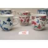 A selection of antique Chinese export hard paste tea or chocolate cups all being hand decorated in