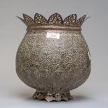 An antique Indian / Chinese planter pot in heavily chase worked and embossed copper in a lotus