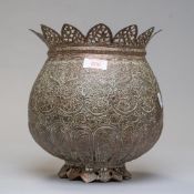 An antique Indian / Chinese planter pot in heavily chase worked and embossed copper in a lotus