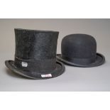 An antique top hat having no makers name and a vintage bowler hat labelled Moores, J moores and sons