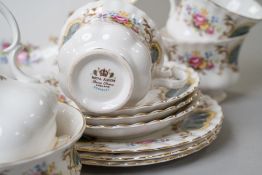 A partial Royal Albert tea service in the Berkley design having floral and motif transfer pattern