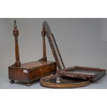 A late Georgian dressing table or toilet mirror having a burr wood veneer with bun feet and silvered