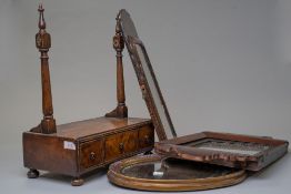 A late Georgian dressing table or toilet mirror having a burr wood veneer with bun feet and silvered