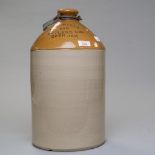 A large earthenware flagon/Beer jar with metal handle for Mitchells and Butlers Ltdof Lancaster,