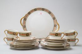 A modern part coffee service serving six having gilt details and transfer design on porcelain marked