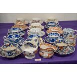 A fine selection of late Georgian early Victorian Hilditch and sons tea cups saucers and similar tea