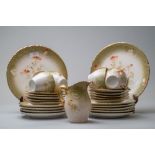 A selection of antique cups and saucers,plates and a jug, having cream and green ground with