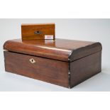 A Victorian jewellery case having rose wood case with ebony banding and a fitted interior in two