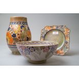 Three pieces of art deco design ceramics including an Arabesque bowl by Charlotte Rhead, a plate