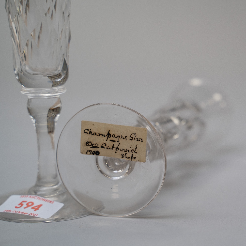 A pair of Victorian champagne flutes having a baluster stem on pain foot with cut body decoration - Image 2 of 2