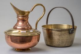 A traditional brass jam pan with cast handle and a copper and brass water jug having large squat