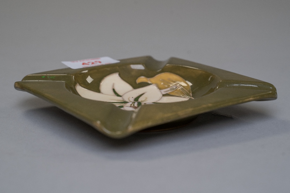 A ceramic ashtray by Moorcroft being stamped to reverse having a green glaze with the Bermuda - Image 3 of 3