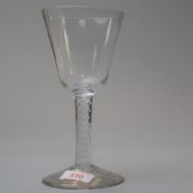 A mid 18th century multi opaque twist stem with an ogee bowl
