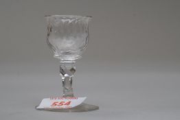 A small liqueur glass engraved with initials WPR.