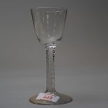 A circa 1750 wine glass gauze opaque stem surrounded by single ribbon.