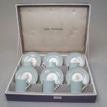 A cased six serving coffee set by Royal Worcester having the Woodland design