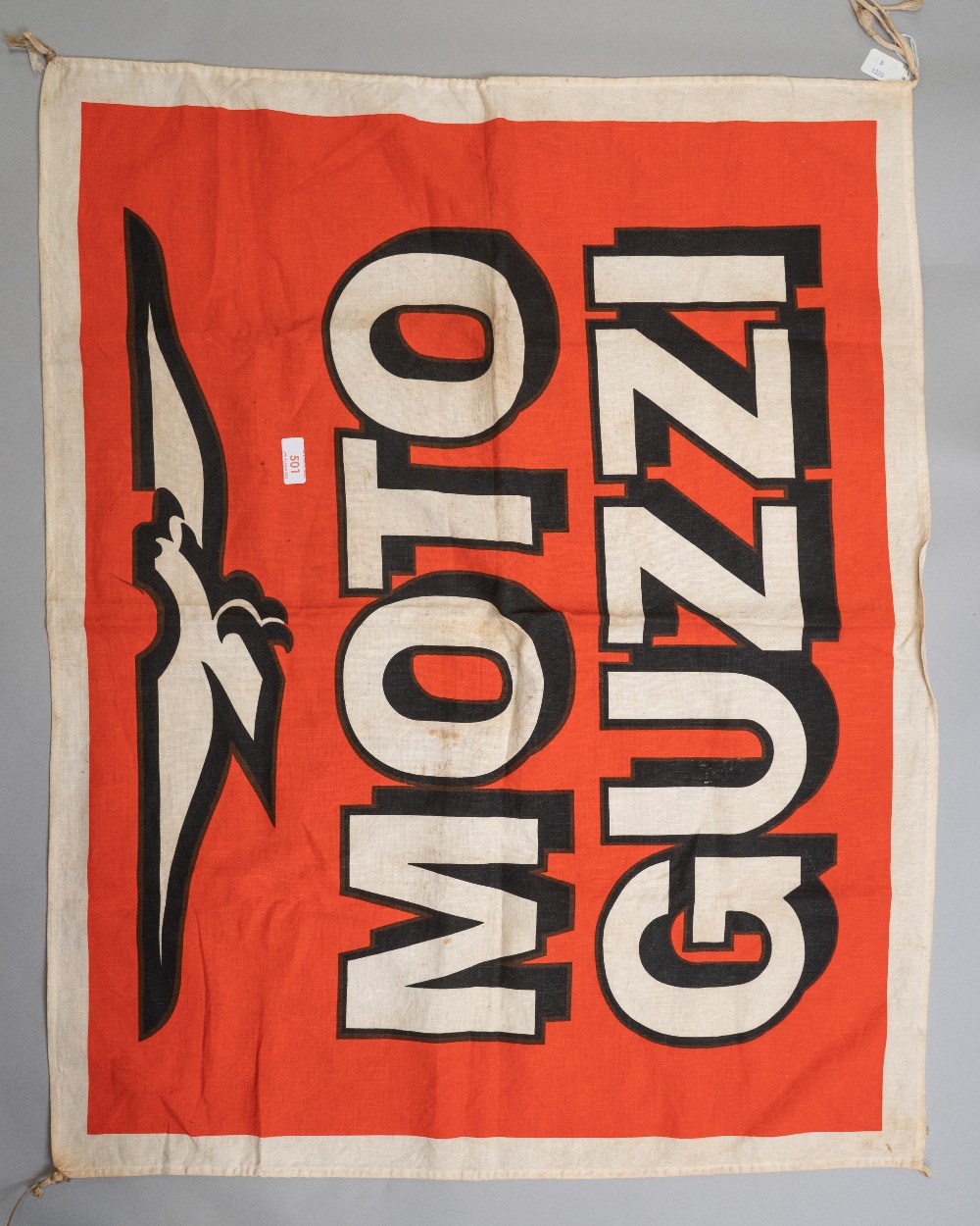 A vintage cloth advertising banner or flag for Moto guzzi motorcycles, approx 34'x 28'.