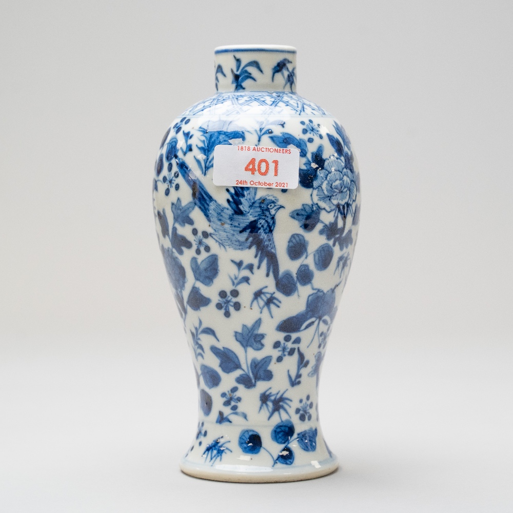A Chinese export vase of baluster form in a hard paste porcelain bearing signature four character