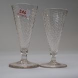 A pair of wrythen fluted glasses.