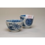 An antique hard paste Chinese export tea cup being hand decorated with unusual scenes and a