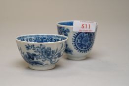 An antique hard paste Chinese export tea cup being hand decorated with unusual scenes and a