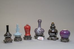 A set of six miniature Chinese vase possibly for salesman or display in various forms and glazes