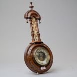 A traditional Victorian small banjo form barometer having mercury thermometer with visible mechanism