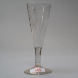 An ale glass on a plain foot decorated bowl with barley and hops