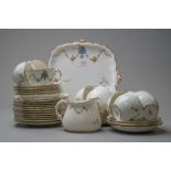 A selection of Royal Crown Derby with cups and saucers,plates and a jug, having white ground with