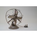 A 1920s/1930s vintage desk top fan, CA 230/250, 50, No 3037242 embossed to plaque on top.