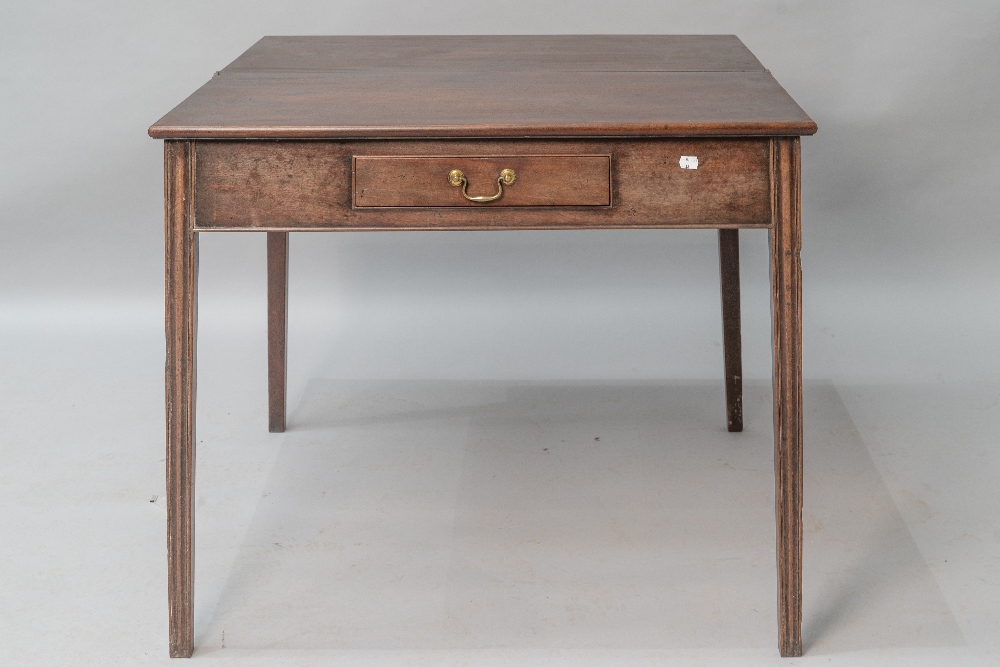 An early 19th Century mahogany fold over tea table having frieze drawer , and fluted legs, closed - Image 2 of 2