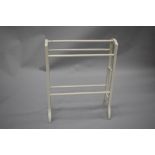 A traditional Victorian style towel rail , later painted