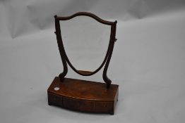 An Edwardian mahogany toilet mirror having satinwood line inlay decoration and triple drawer