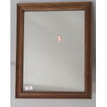 A vintage oak frame wall mirror, approx. 46 x 36cm, in good condtion with little wear to glass