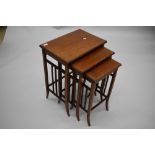 An Edwardian mahogany and inlaid trio nest of tables , having triple rail ends and tapered splay